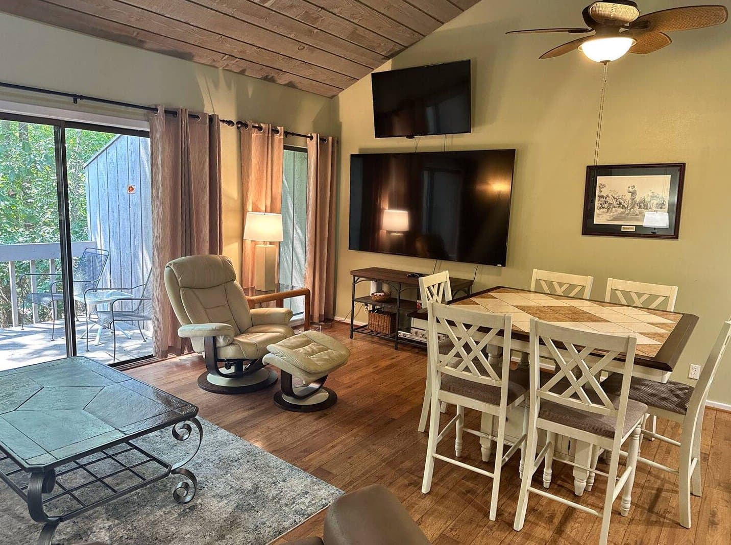 85-inch TV and dining area
